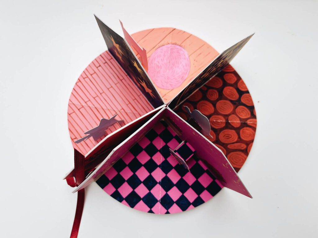 Intricate pop-up book design and paper engineering mechanism by Judit Orosz.